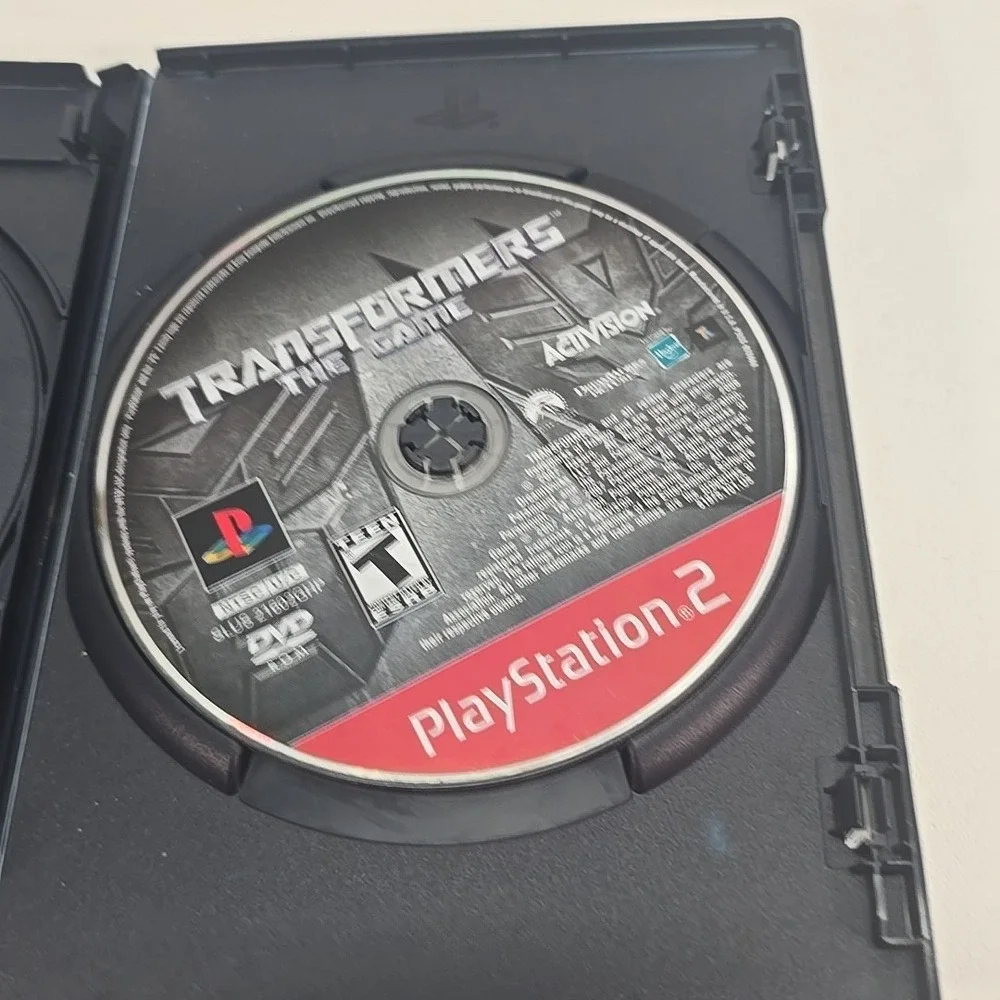 Transformers : The Game-Greatest Hits Sony PlayStation 2 PS2 +Bonus Disc! Tested